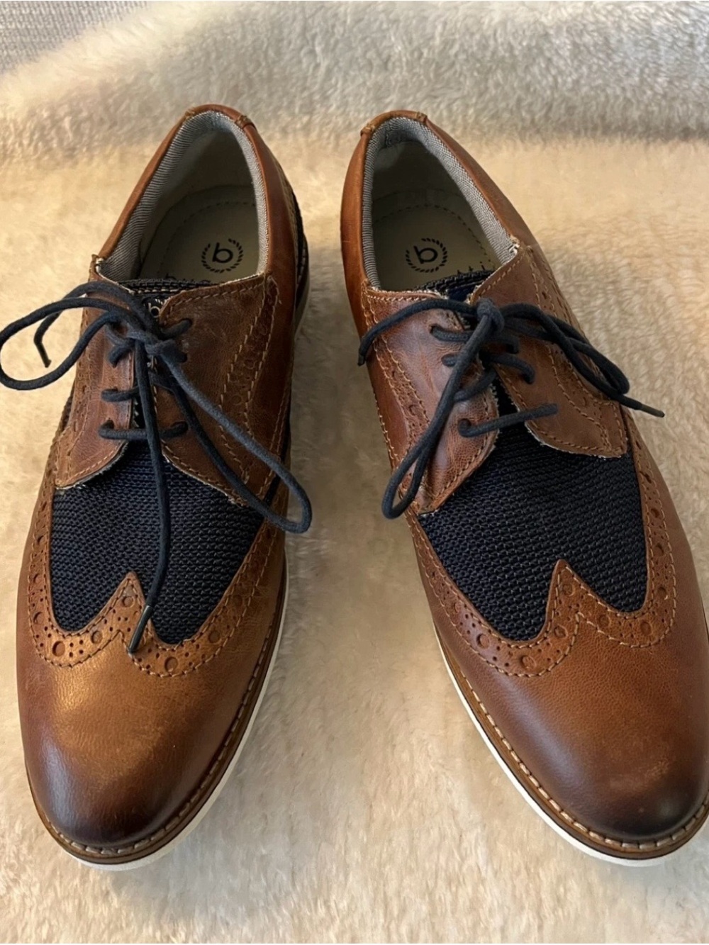 Bugatti Men's Leather Wingtip Derby in Brown and Black